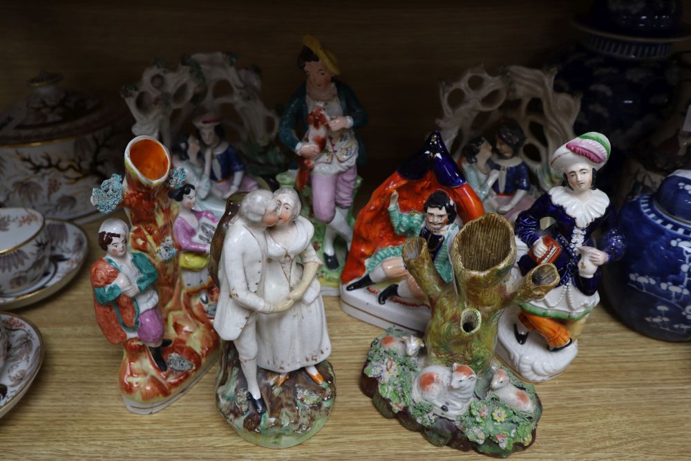 Eight Staffordshire pottery figures and groups